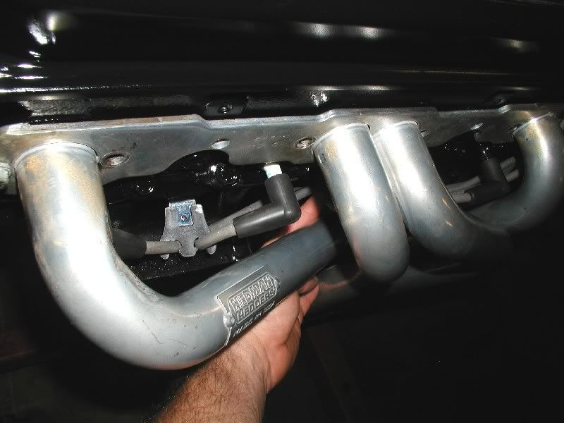 Spark plug wire looms...under header or not? Message